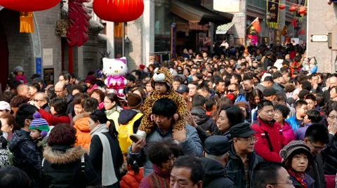 Crowds in Chinese spring festival temple fair Stock Footage
