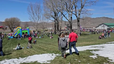 Crowds enjoying Easter celebration with residual snow Stock Footage 239503162