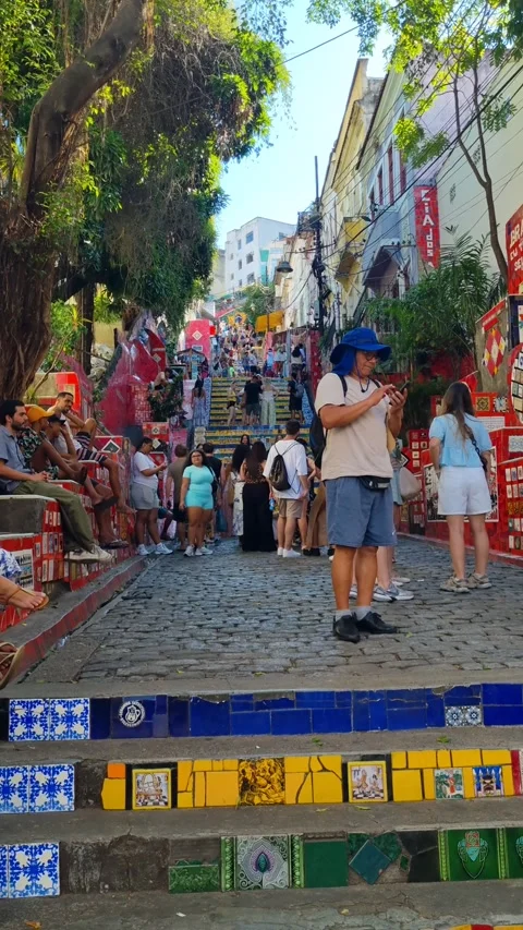 Crowds explore the iconic Escadaria Selarón in Rio de Janeiro, Brazil Stock Footage 339769357