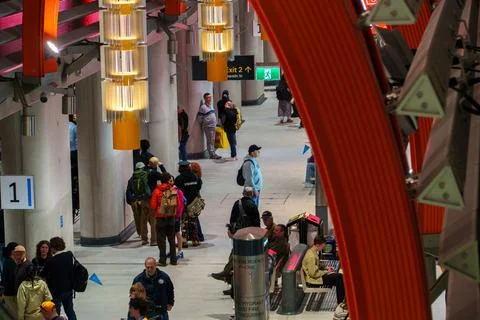 Crowds Explore State Library Station's Modern Interior on the Metro Tunnel'.. Stock Photos