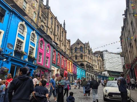 Crowds exploring the vibrant and colorful historic Victoria Street in Old Town Stock Photos