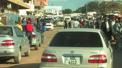 Crowds filter through African Market Stock Footage