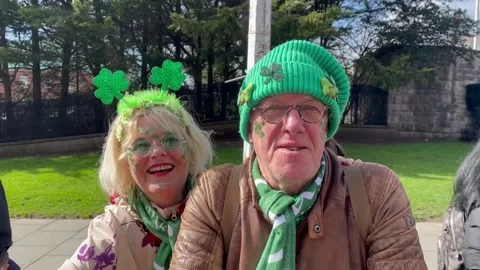 Crowds gather in Dublin city centre to watch the St Patrick's Day parade Stock Footage 330944057