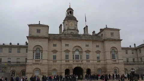Crowds gather at Horse Guards Parade central London waiting for the changing of Stock Footage 337513063