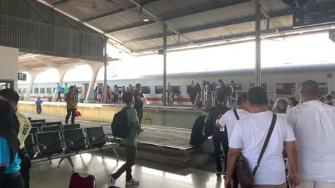 Crowds Gathering: Commuters Waiting for the Train Stock-Footage 244514430