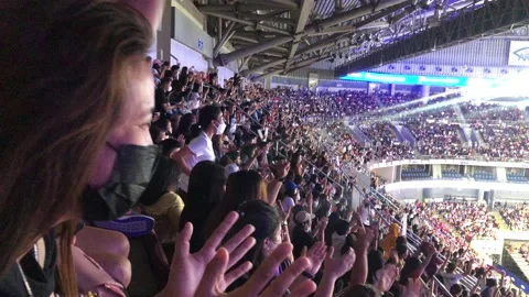 Crowd's happy reaction while wearing a mask in the arena Stock Footage 201802967