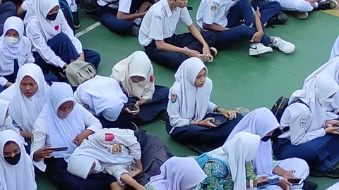 Crowds of junior high school students in Java, Indonesia Stock Footage 244436217