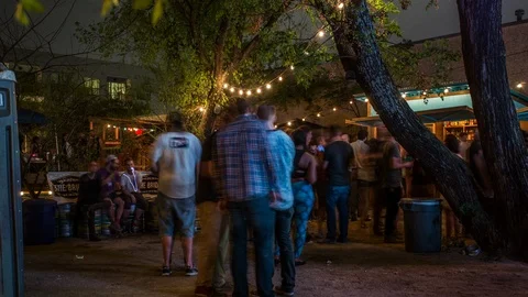 Crowds Mill About on Bar Patio Stock Footage 88160345
