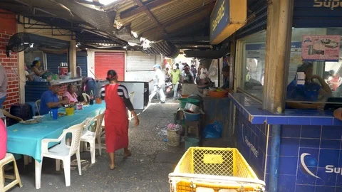 Crowds move through open air market in Cartagena Colombia Video stock 109132192