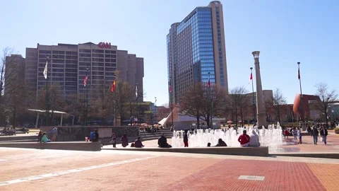 Crowds of people at Centennial Olympic Park gather close together during the  Stock Footage 147614100