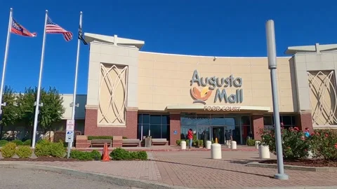 Crowds of people entering and exiting the Augusta Mall Stock Footage 143122009