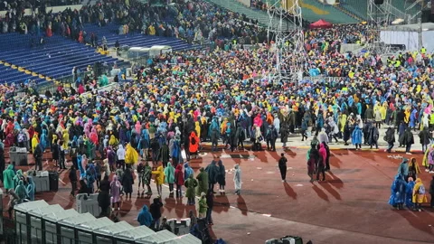 Crowds of people exiting Vasil Levski stadium after concert Stock Footage 320669671