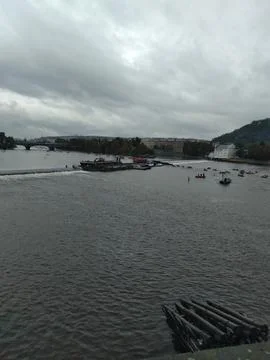 Crowds of people float down the Vltava River in Prague Stock Photos
