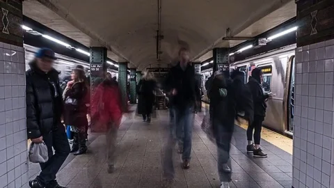 Crowds of people getting onto subway time lapse in New York City Stock Footage 71475600