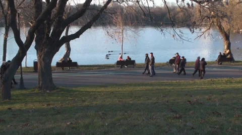 Crowds Of People In The Park On A Nice Spring Day Side-Shot Stock Footage 34012819