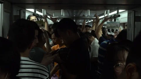 Crowds Of People Use The Subway (Metro) During Rush Hour In Beijing, China Stock Footage 116754579