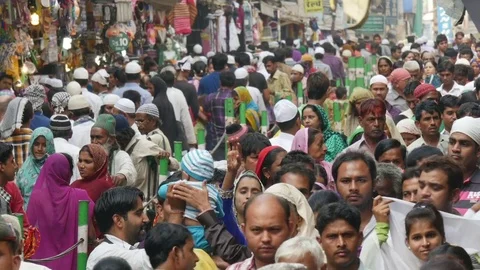 Crowds of people walk through narrow street in Ajmer, India Stock Footage 85454380