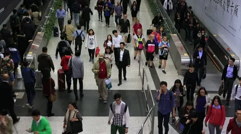 Crowds of people walking in Central MTR subway station in Hong Kong Stock Footage 44637523