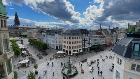 Crowds of people walking down the Stroget street in copenhagen on a sunny day Видео 158992626