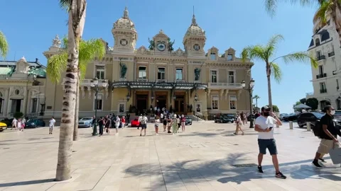 Crowds of people walking in front of the Monte Carlo casino Stock-Footage 160288734