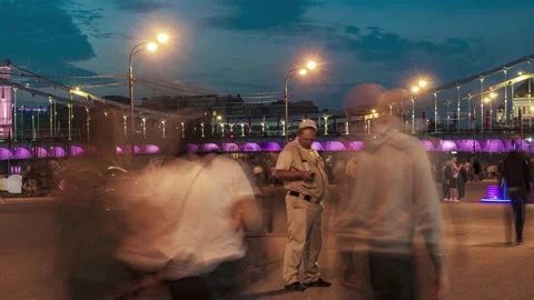 Crowds of people walking on a summer weekend on the waterfront in the city Pa Stock Footage 138775070