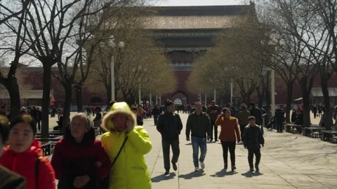Crowds of People Walking Toward Historic Gate in Beijing Forbidden City Stock Footage 345817166