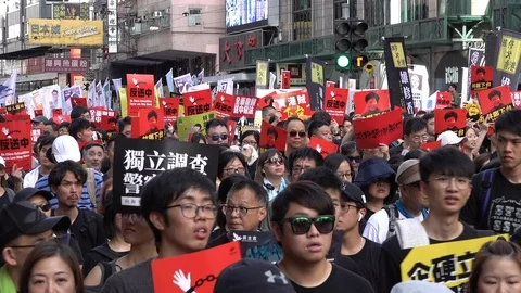 Crowds of protesters rally against extradition bill, demonstrations Hong Kong Stock Footage 124233230