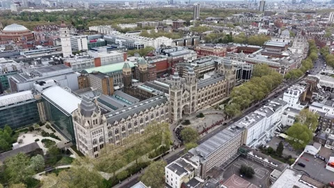 Crowds queuing outside Natural History Museum London drone aerial view Stock Footage 334166225