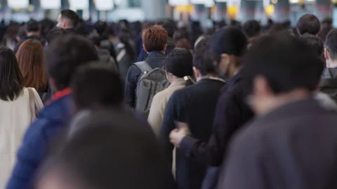 Crowds of rush hour commuters in Tokyo from behind (editorial) 動画素材 295223507