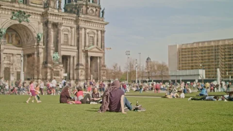 Crowds sit in front of Berlin Cathedral Stock Footage 124365565