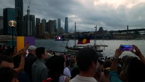 Crowds in Sydney watch Aboriginal flag on boat on Australia Day 4K Stock Footage 330583268