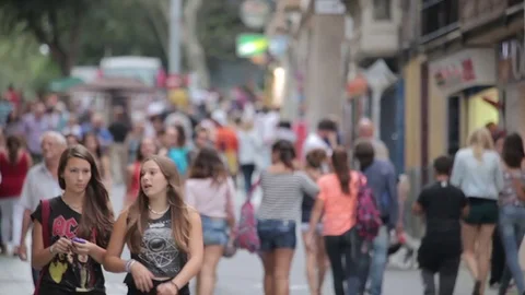 Crowds of tourists walking along the streets of the city. Stock Footage 80141075