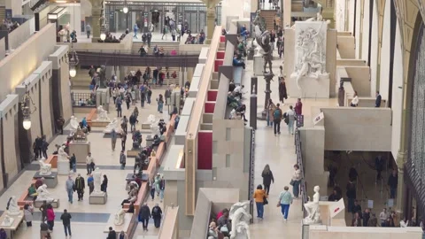 Crowds of Visitors Exploring Main Sculpture Hall of Musée d'Orsay in Paris Stock Footage 339937352