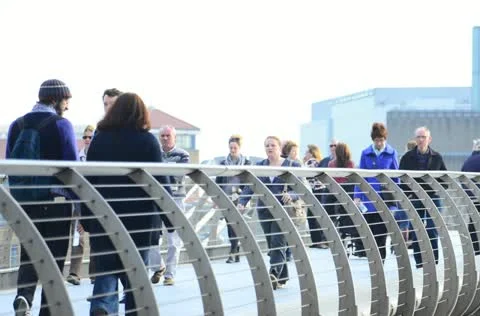 Crowds walking across Millenium bridge, Timelapse Stock Footage 10867223