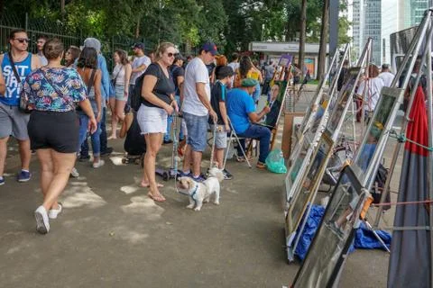 Crowds walking and looking at performances in Paulista Avenue on Sunday Stock Photos