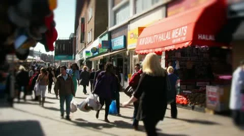 Crowds walking past ethic halal meat shop butcher Video stock 10861236