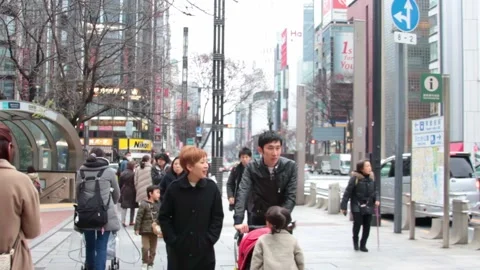 Crowds walking by in the street Video stock 168473958