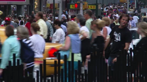 Crowds walking in Times Square on a summer afternoon Stock Footage 59454938