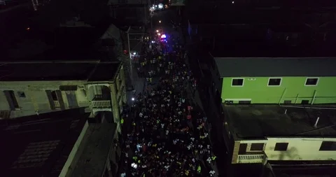 Crowds wander streets during Mardi Gras in Haiti Stock Footage 86036389