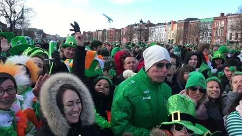 Crowds watch St Patricks Day Parade in Dublin Stock Footage 148643329