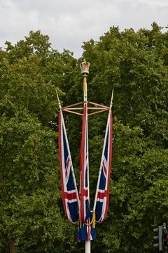 Crown and Union Jack Flags on Pole  in London, UK. Stock Photos