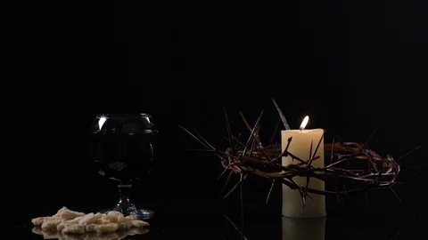 Crown Of Jesus, Candle Bread and Wine on Black Background Stock-Footage 130160709