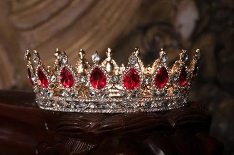 Crown with red ruby gemstones 写真素材
