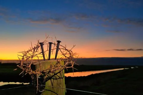 Crown of Thorns and Three Nails Sky of Dawn Stock Photos
