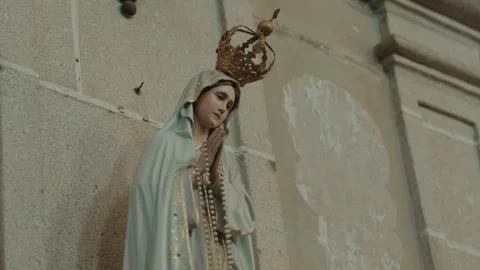 Crowned Statue Of Our Lady Of Fatima Praying With Rosary In Church In Portugal Stock Footage 337913344