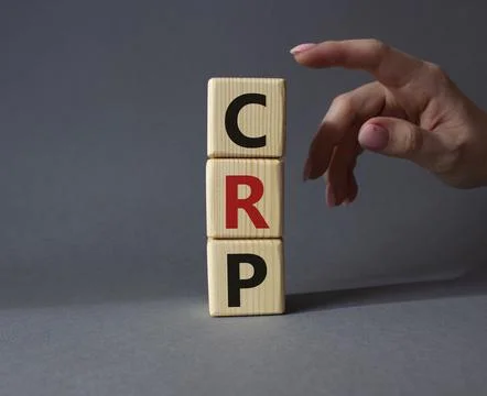 CRP - C-Reactive Protein Test symbol. Wooden cubes with word CRP. Doctor ha.. 写真素材
