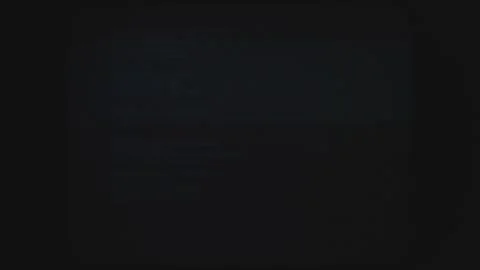 CRT Screen Flickers With Blue Error Code in Moody Dark Hacker Room Stock Footage 311176427