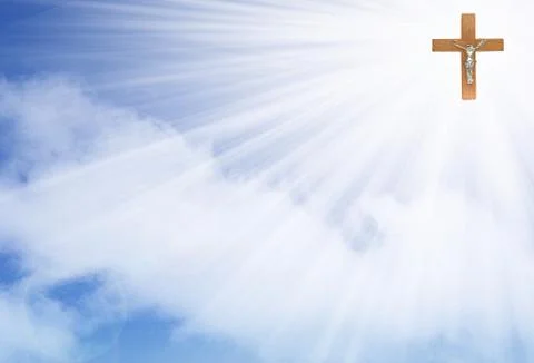 Crucifix in the rays of light Stock Photos