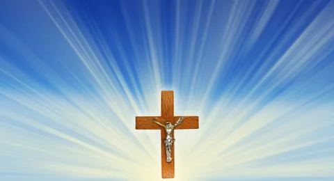 Crucifix in the rays of light Stock Photos