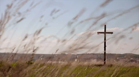 Crucifixion and windy grass Stock Footage 65746053